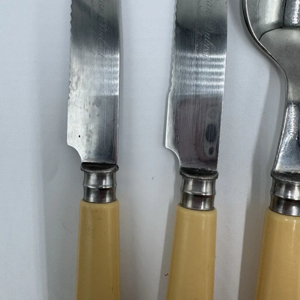Jean Dubost Yellow Flatware 8 Pc Lot Stainless France Knives Spoons